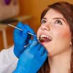 Сколько стоит вставить зубы: таблица, особенности и рекомендации
